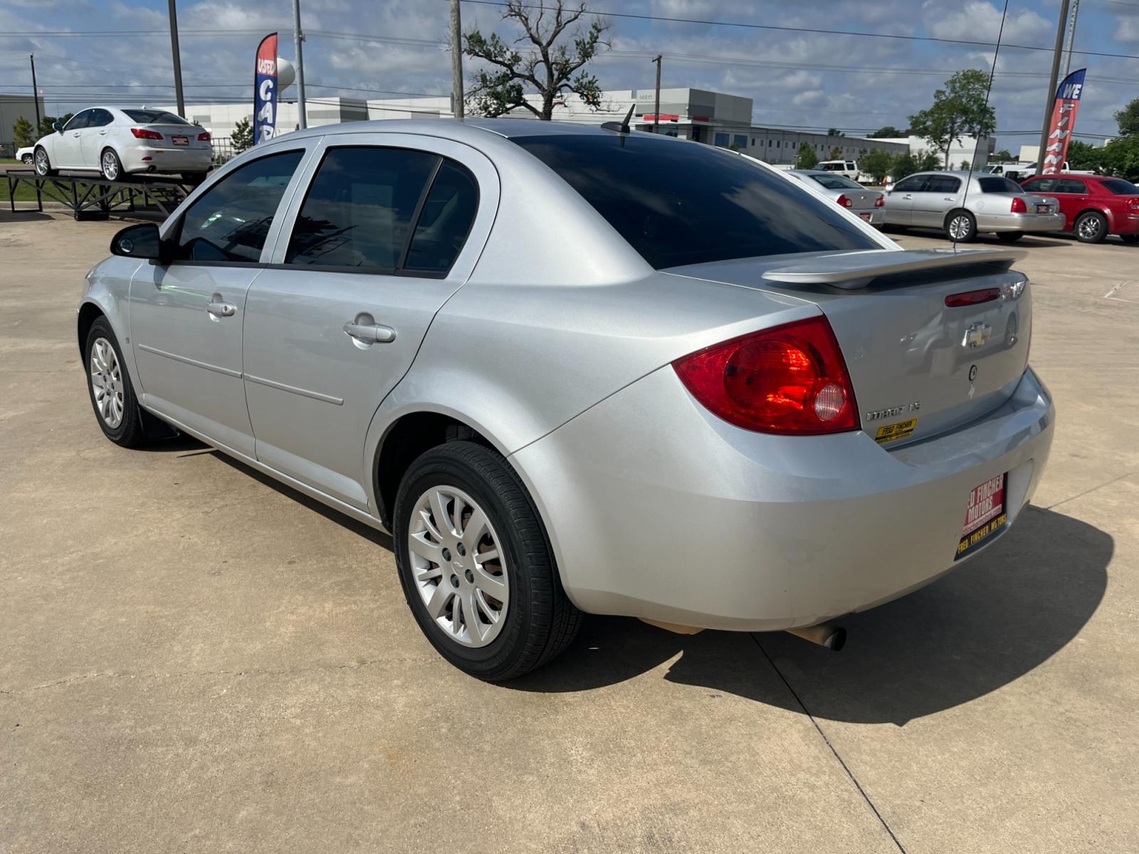 2009 SILVER /black Chevrolet Cobalt LS Sedan (1G1AS58H697) with an 2.2L L4 DOHC 16V engine, 4-Speed Automatic Overdrive transmission, located at 14700 Tomball Parkway 249, Houston, TX, 77086, (281) 444-2200, 29.928619, -95.504074 - Photo #4